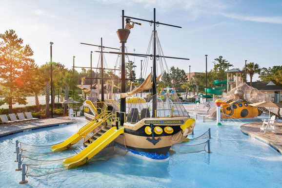 Family-focused resort water park featuring slides and play areas designed for guest recreation and experience.